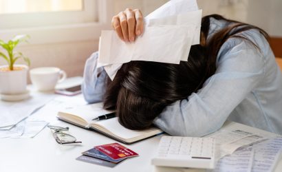 Stressed,Young,Woman,Calculating,Monthly,Home,Expenses,,Taxes,,Bank,Account